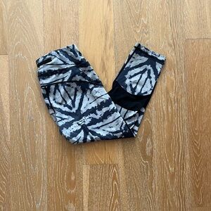 Women's Black and White Geometric Leggings heavily worn
